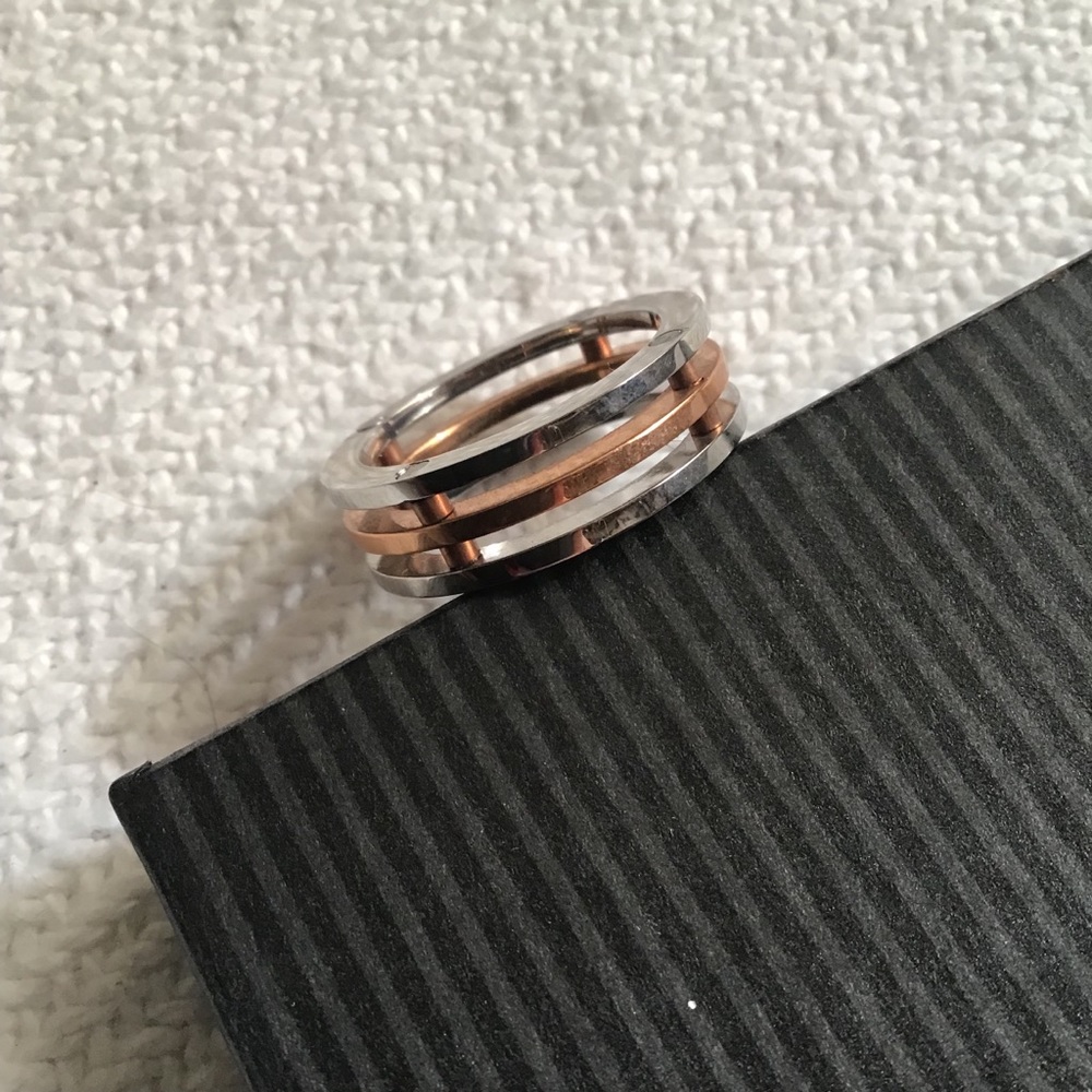 Silver and copper toned ring